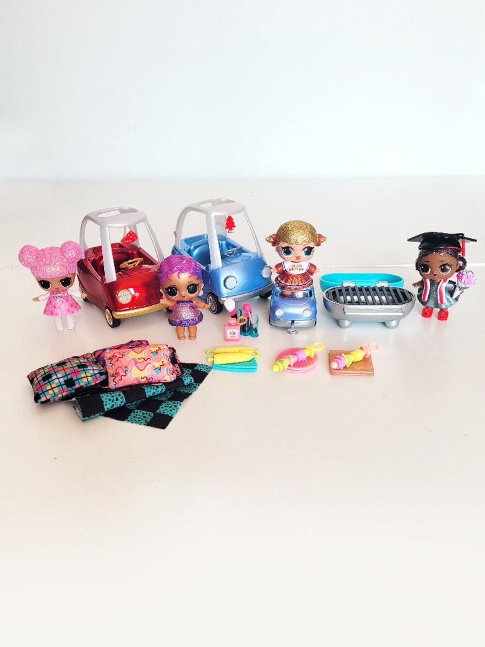 LOL Surprise Dolls with Cozy Coupe Cars and Accessories
